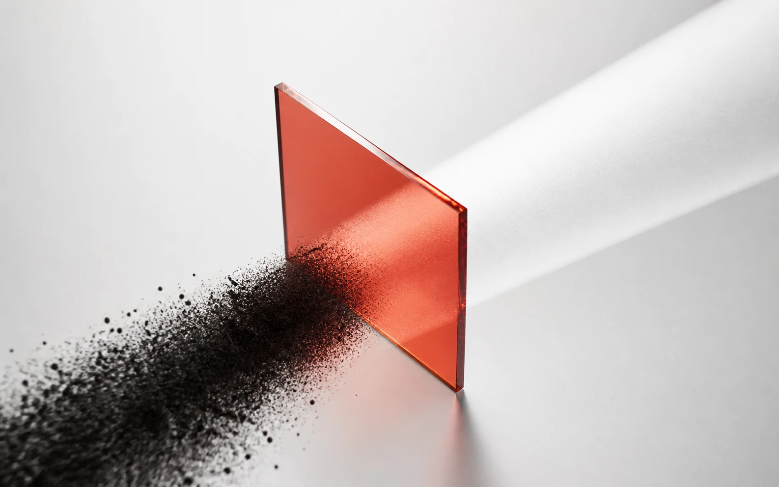 Carbon particles pass diagonally through a vermilion optical plane and resolve into one broad aluminium beam.
